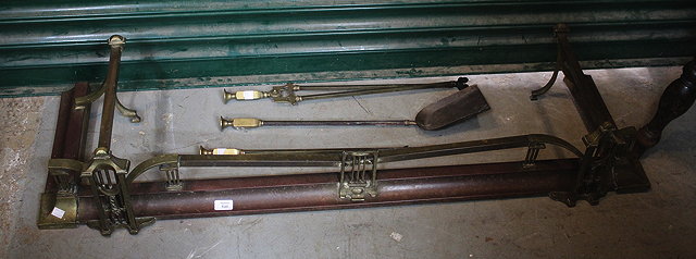 Appraisal: AN ART NOUVEAU COPPER AND BRASS FIRE FENDER and three