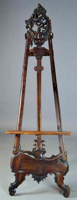 Appraisal: Large Carved Wood Easel - Eastlake StyleCarved wooden easel frame