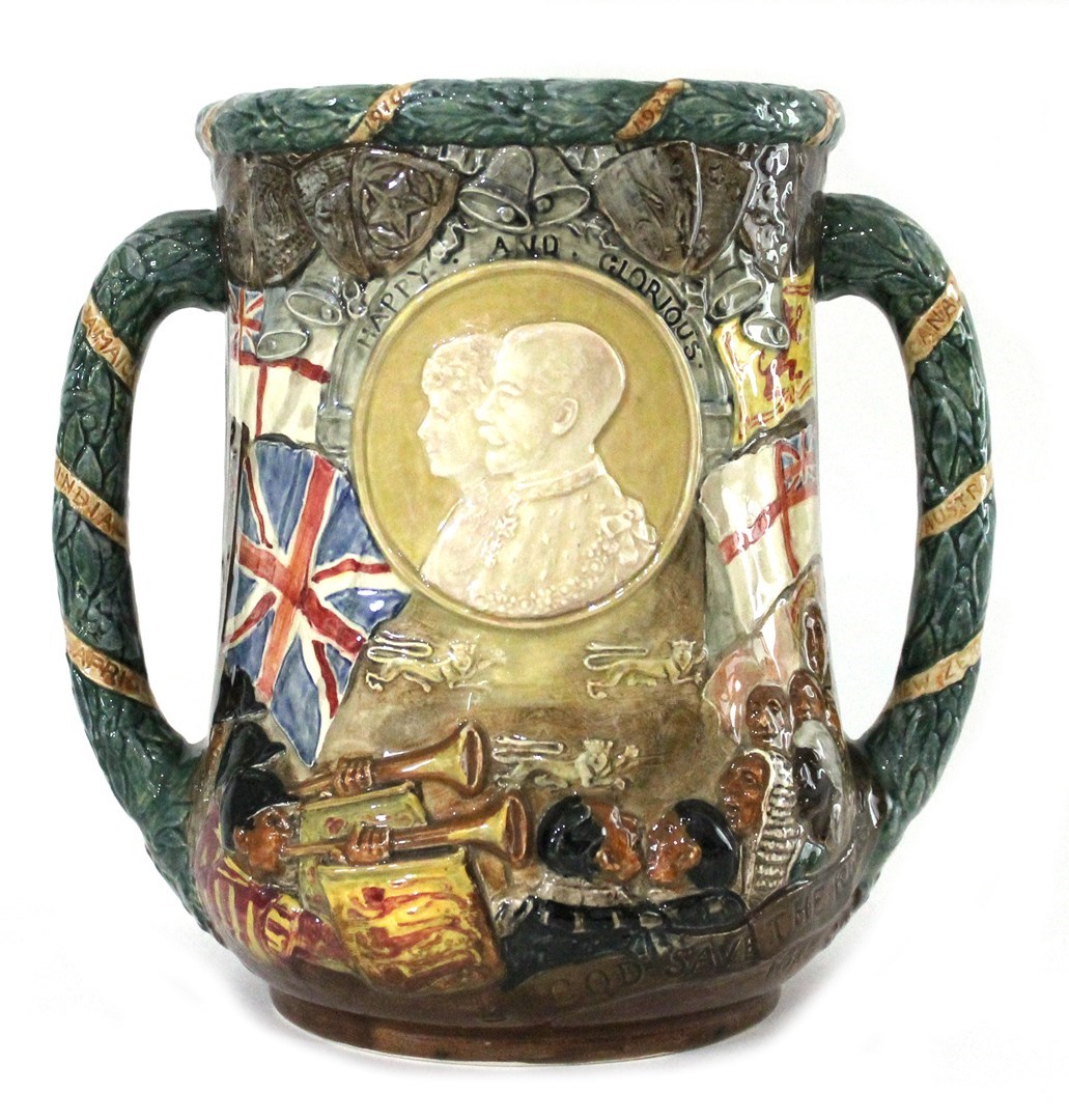 Appraisal: A Royal Doulton loving cup by Charles Noke commemorating King