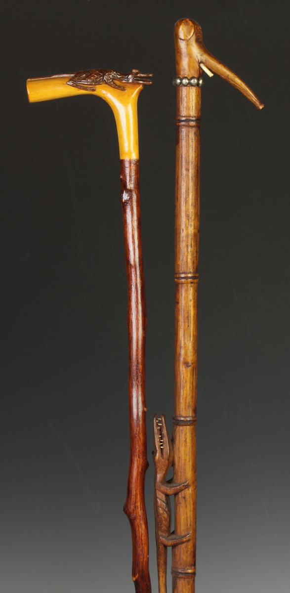 Appraisal: Two Carved Wood Canes w Alligators Elephant Handle Elephant missing