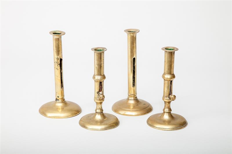 Appraisal: Two Pairs of English Brass Candlesticks Ejectors plugged at base