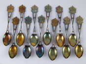 Appraisal: Twelve matching silver golfing prize teaspoons each with crossed clubs