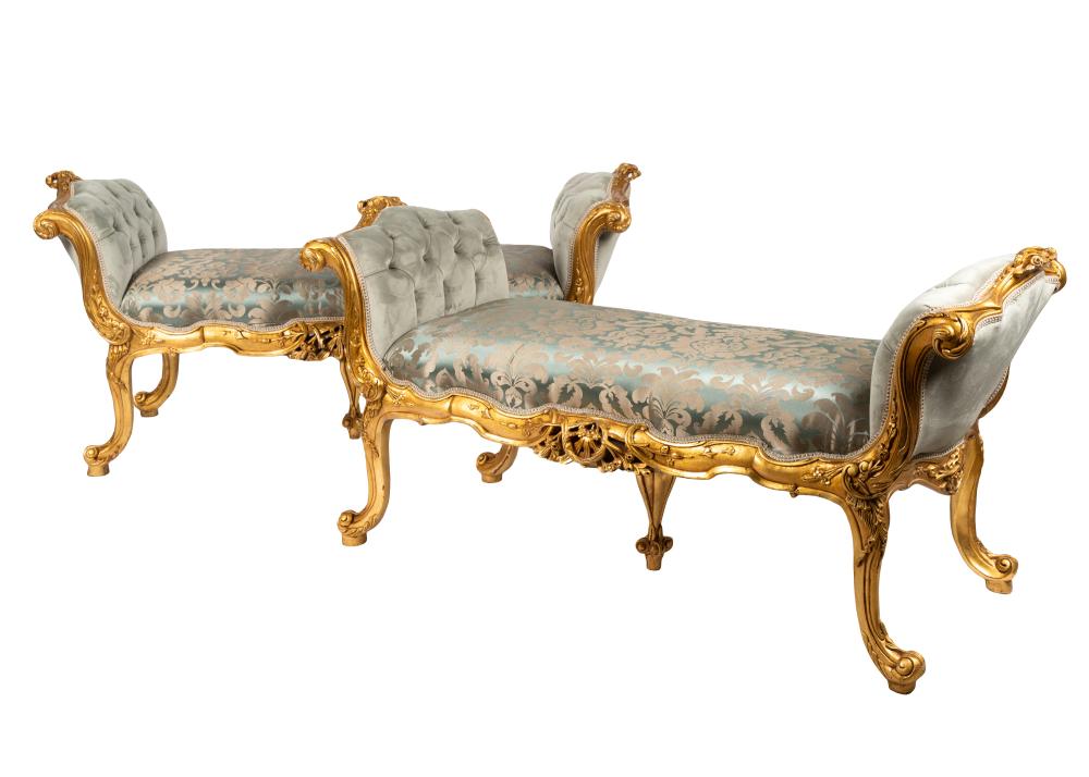 Appraisal: PAIR OF ROCOCO-STYLE GILTWOOD WINDOW SEATSthe armrests covered with grey