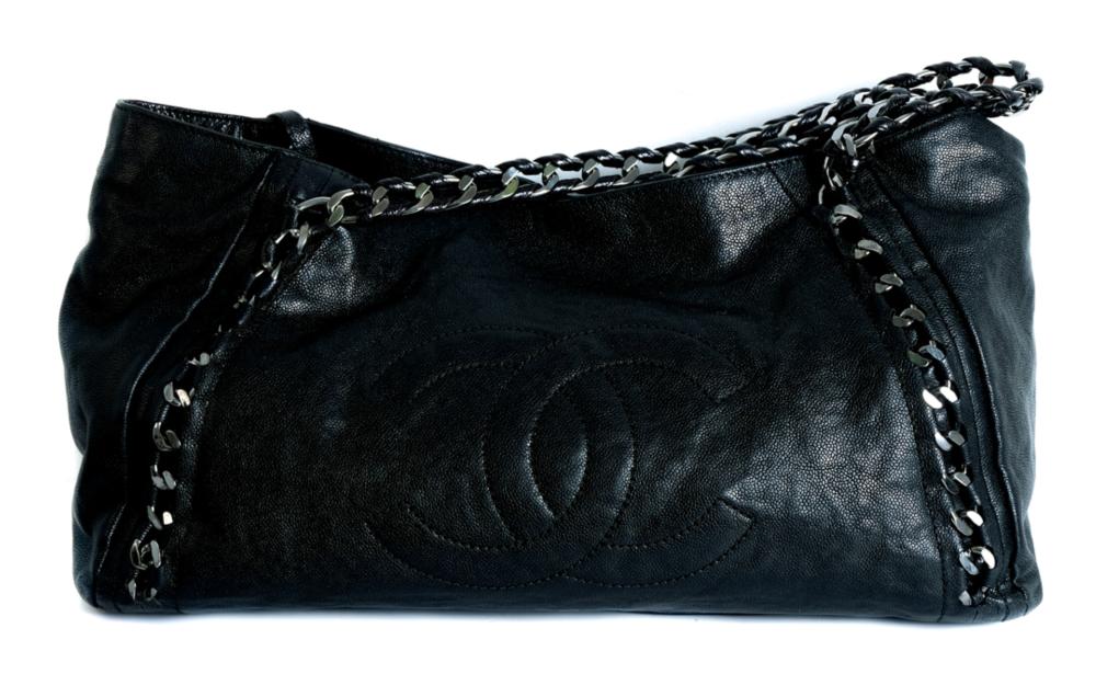 Appraisal: MASSIVE AND IMPORTANT CHANEL JUMBO CALFSKIN PURSEMassive important Chanel caviar