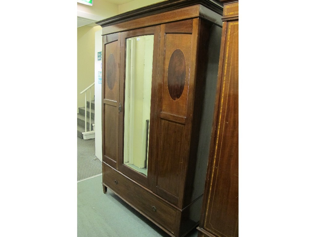 Appraisal: Edwardian mahogany inlaid mirror door wardrobe