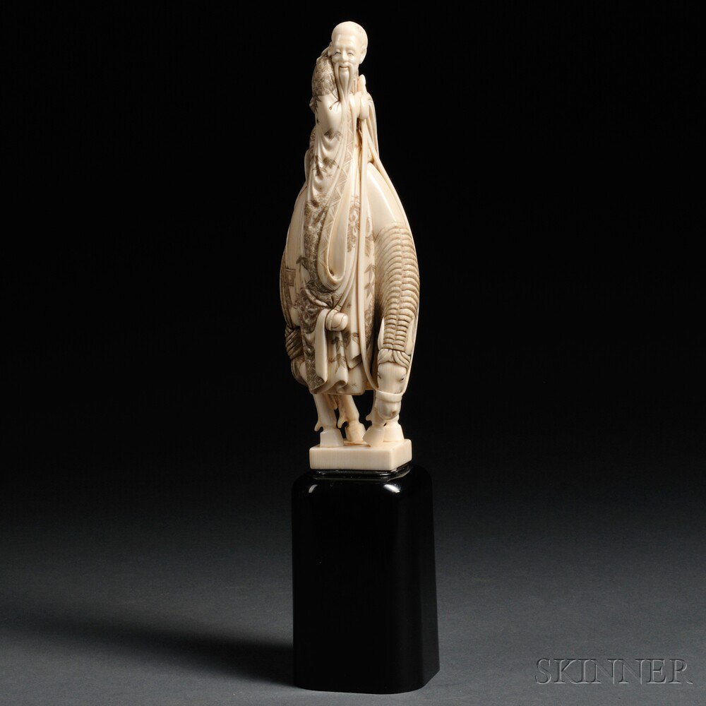 Appraisal: Ivory Okimono of a Sennin Japan th th century riding