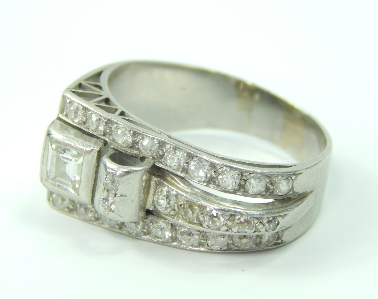 Appraisal: An Art Deco white metal and diamond ring set with