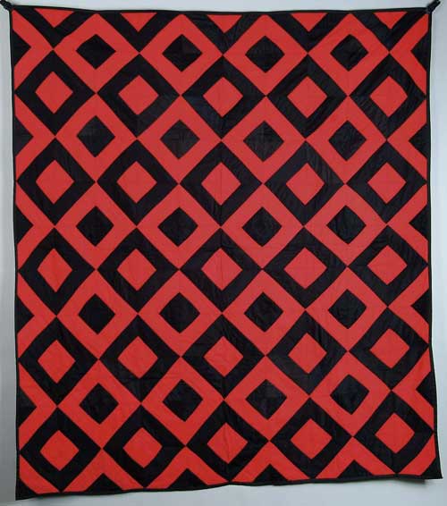 Appraisal: RED AND BLACK PATCHWORK QUILT Amish or Mennonite quilt has