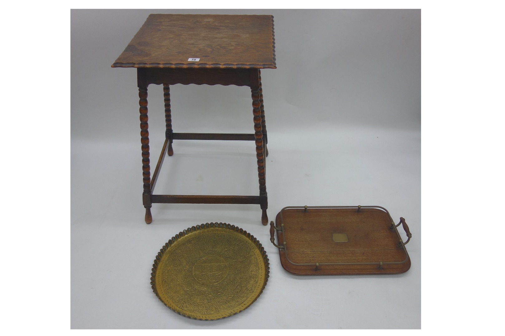 Appraisal: A square oak occasional table on bobbin turned legs in