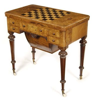 Appraisal: A Victorian walnut games work table the hinged and swivel