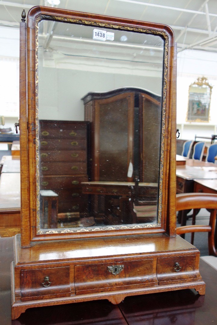 Appraisal: An th century parcel gilt walnut toilet mirror with cushion