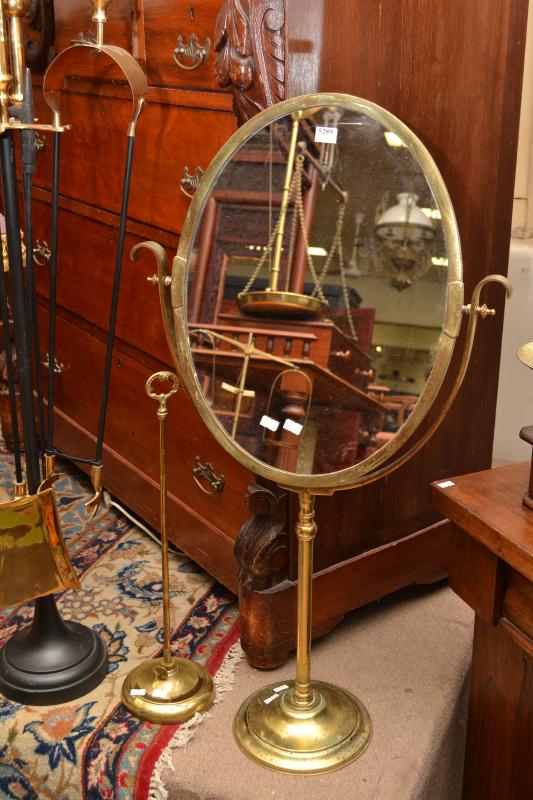 Appraisal: A BRASS VANITY MIRROR WITH BRASS STAND A BRASS VANITY