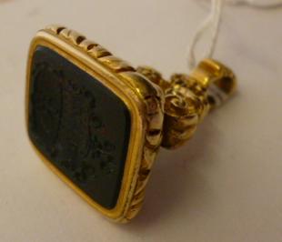 Appraisal: A GEORGIAN GOLD FOB the oblong bloodstone seal incise carved