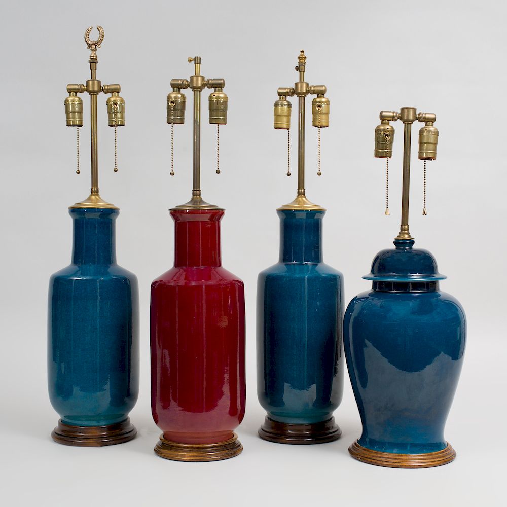 Appraisal: Group of Four Glazed Porcelain Lamps The tallest in high