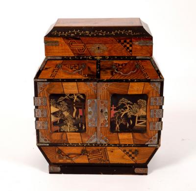 Appraisal: A Japanese parquetry and laquered table cabinet the two door