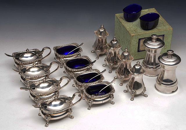 Appraisal: A SILVER TABLE CRUET SERVICE TO INCLUDE four salts cellars