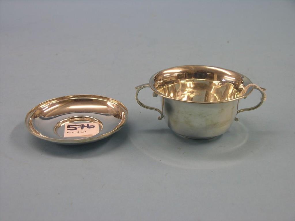 Appraisal: A silver bowl on stand bowl with twin-scroll handles uncommon