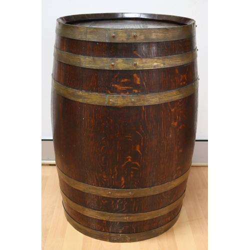 Appraisal: Large English oak barrel with brass banding approx cm H