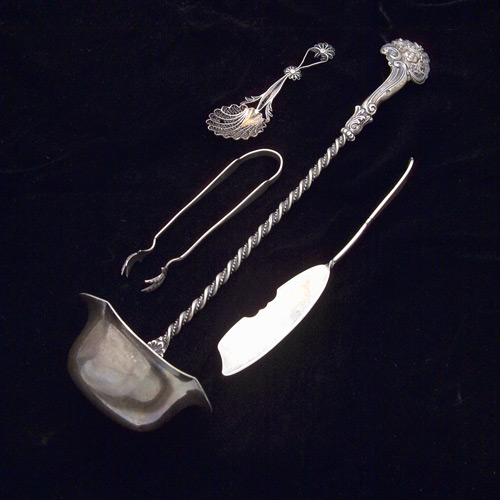 Appraisal: Assortment of interesting serving pieces large ladle with low relief