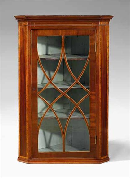 Appraisal: Federal inlaid mahogany hanging cupboard early th century The molded