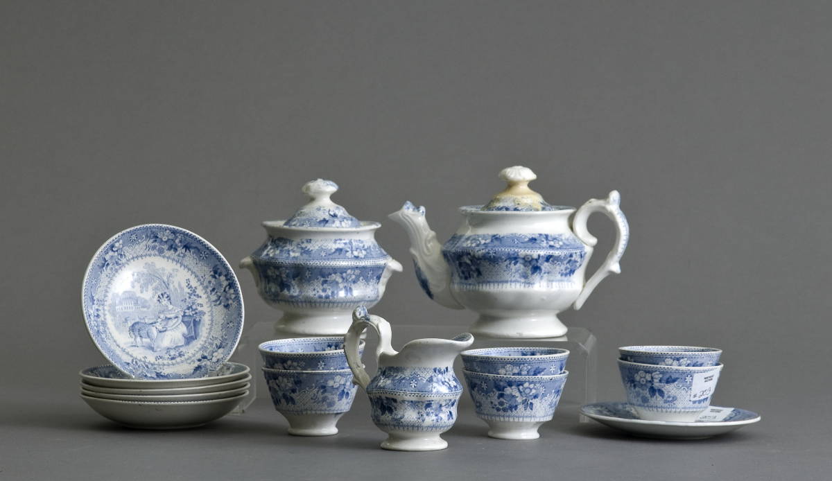 Appraisal: STAFFORDSHIRE BLUE TRANSFER PRINTED CHILD'S TEA SET Comprising a teapot