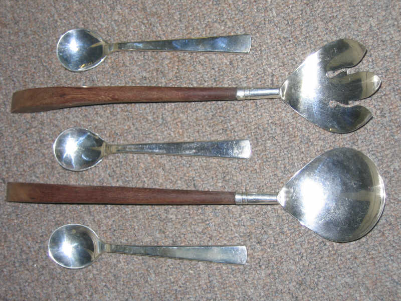 Appraisal: TEN PIECES MEXICAN SILVER FLATWARE Eight Taxco spoons and two-piece