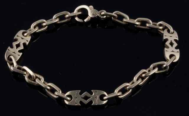 Appraisal: An ct gold bracelet the links interspersed by three pierced