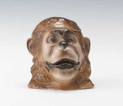 Appraisal: A Porcelain Monkey Head Tobacco Jar Smiling head of a