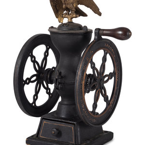 Appraisal: A Landers Frary Clark Cast Iron Coffee Mill with an