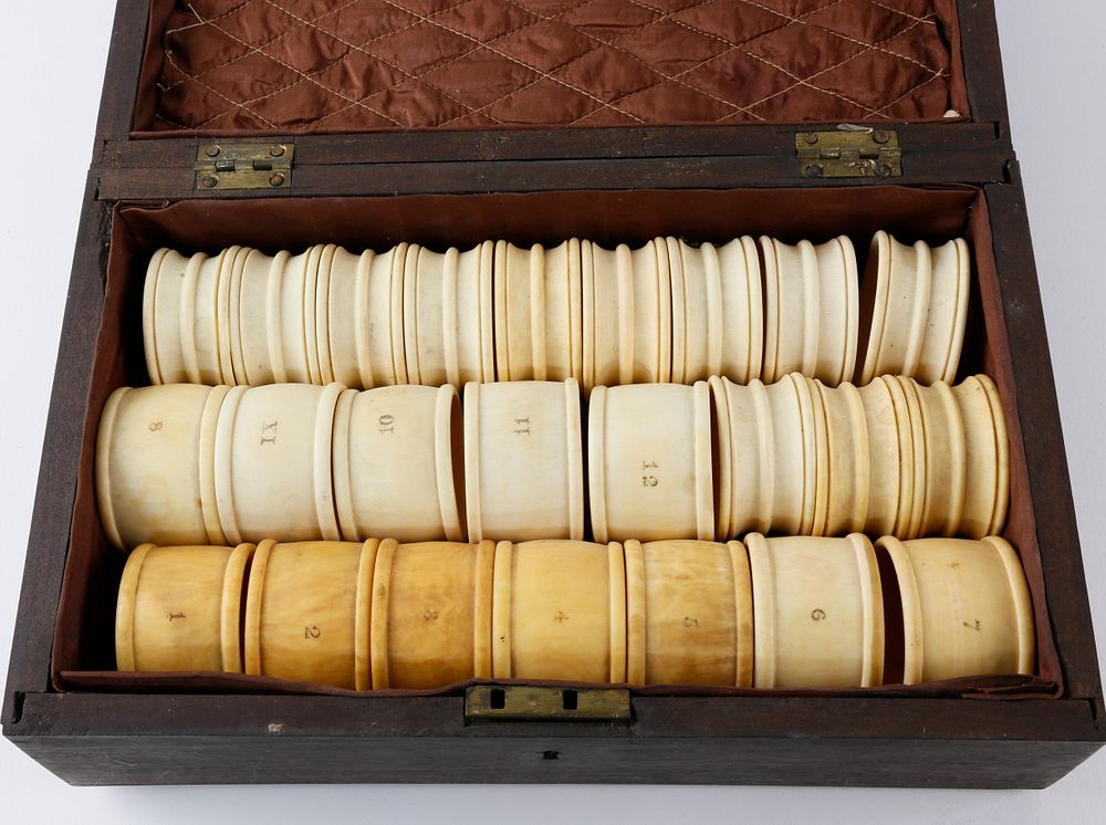 Appraisal: Two Sets of Cased Whaleman Made Whale Ivory Napkin Rings