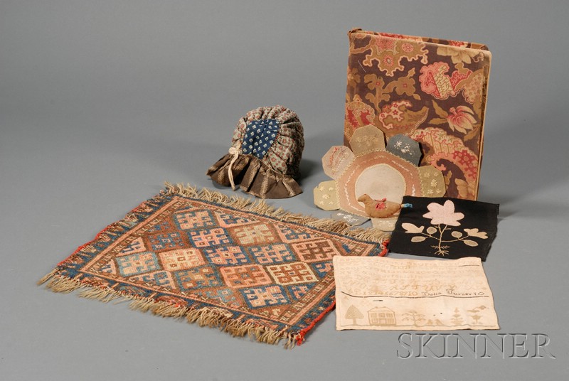 Appraisal: Six Miscellaneous Textiles th century a printed cotton cloth-covered geography