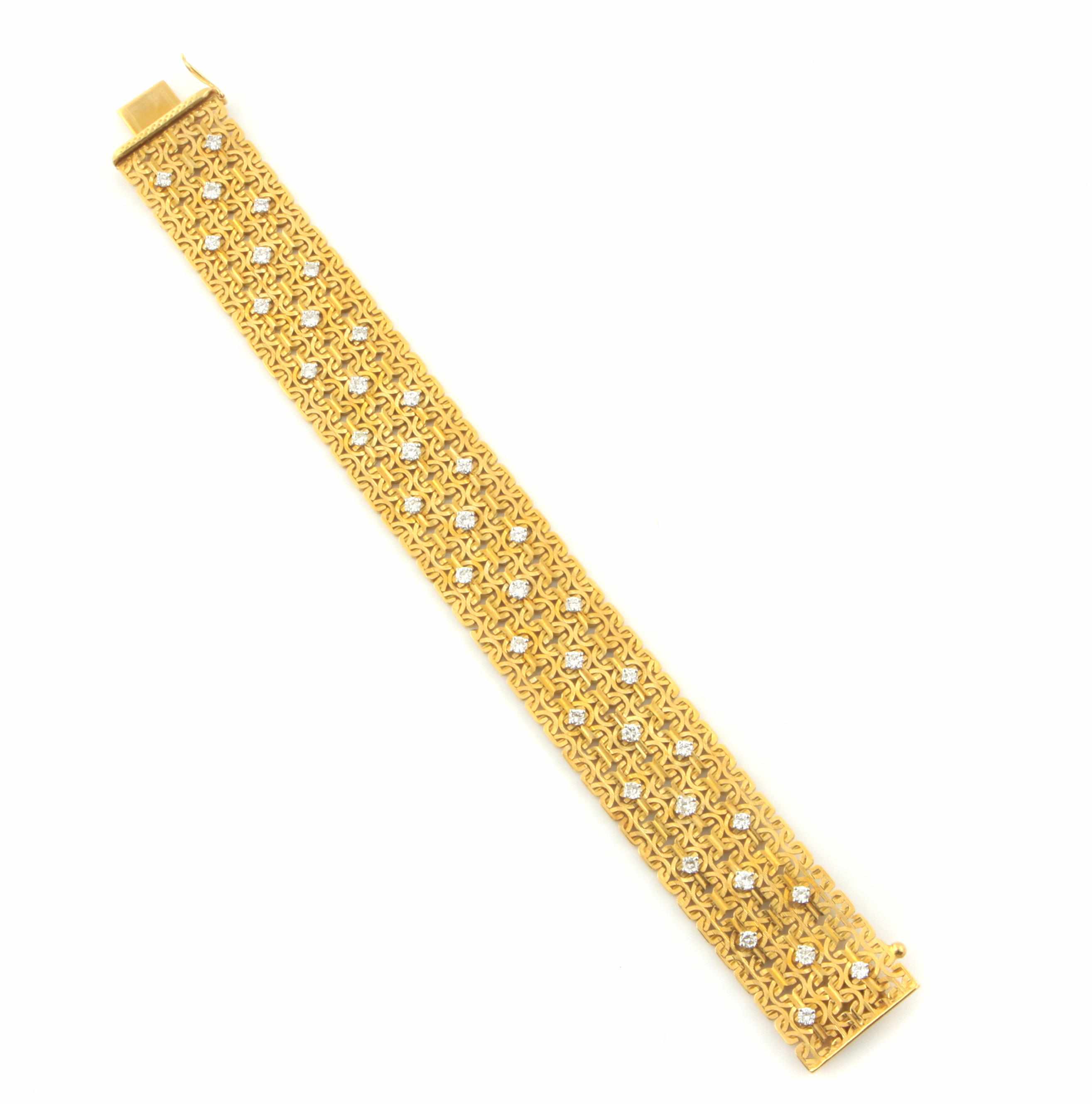 Appraisal: A diamond and k gold strap bracelet estimated total diamond