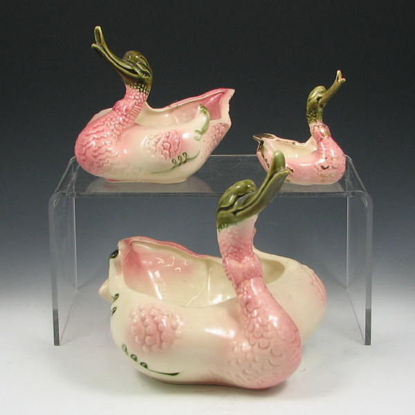 Appraisal: Hull Novelty Swans Lot of seven swans in pink and