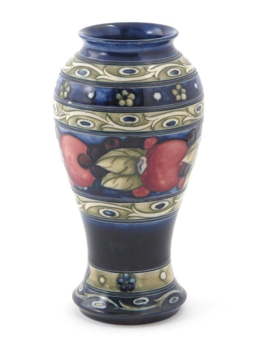 Appraisal: Banded Pomegranate a Moorcroft Pottery baluster vase designed