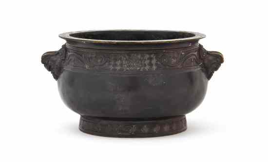 Appraisal: A Chinese Bronze Censer of circular form with wide rim