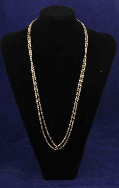 Appraisal: A ct gold guard chain of pierced geometric links approximately