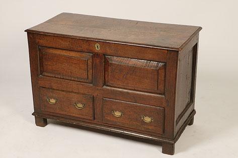 Appraisal: A GEORGE I OAK MULE CHEST the rectangular top with