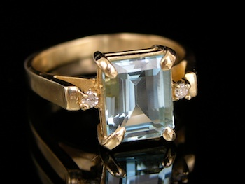 Appraisal: An Aquamarine and Diamond Ring k yellow gold ring set