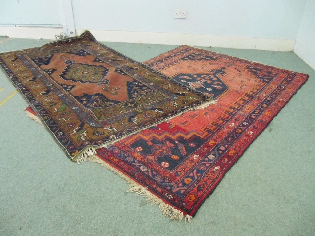 Appraisal: Two Eastern floor rugs both with multi coloured geometric designs