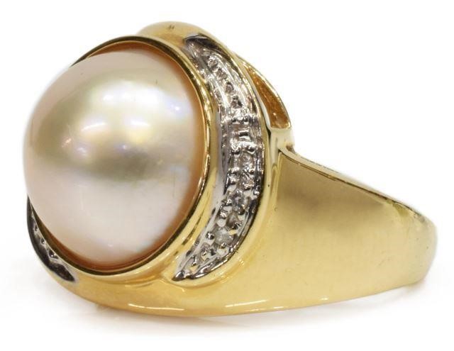 Appraisal: Estate kt yellow gold ring central mabe pearl surrounded by