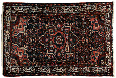 Appraisal: Sarouk rug central medallion on dark blue ground pale salmon