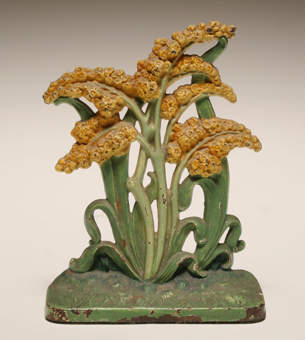 Appraisal: Hubley cast iron doorstop Goldenrod flowers H Some wear to