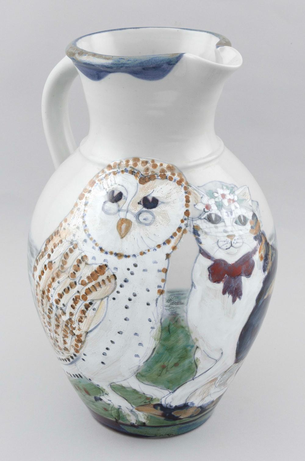 Appraisal: CERAMIC PITCHER DEPICTING AN OWL AND A CAT th Century