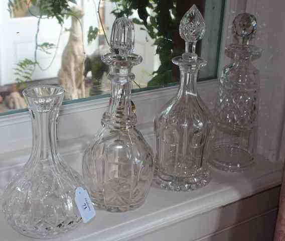 Appraisal: A COLLECTION OF THIRTEEN VARIOUS DECANTERS to include one by