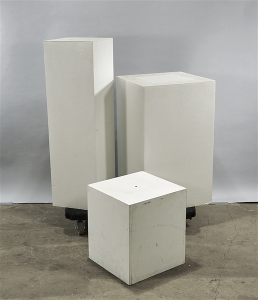 Appraisal: Three white pedestals x sq tallest approx Condition used as-is