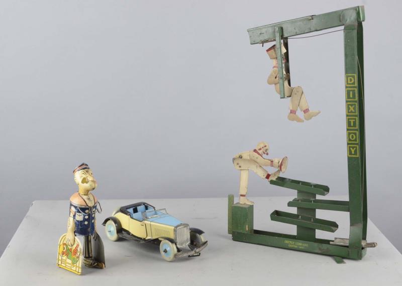 Appraisal: Lot Of Vintage Tin Toys Includes - clown marble game