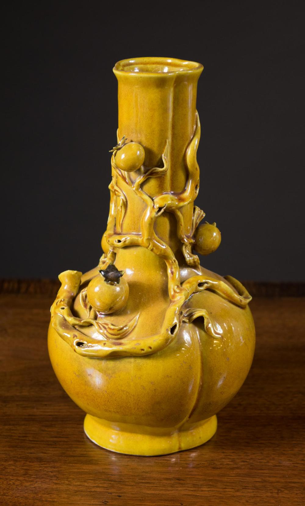 Appraisal: CHINESE PORCELAIN VASE bulbous form with golden yellow glaze and