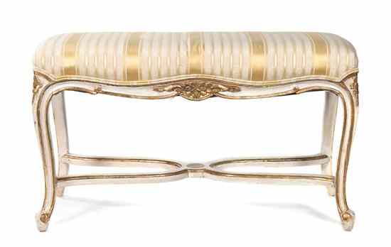 Appraisal: A Louis XV Style Parcel Gilt Painted Window Bench having