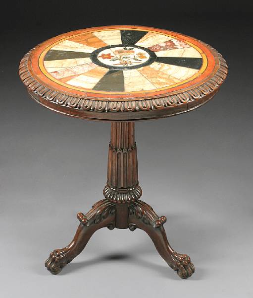 Appraisal: A William IV carved mahogany and specimen marble center table