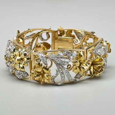 Appraisal: DIAMOND PLATINUM AND K GOLD GARDEN BRACELET Five tonneau shaped